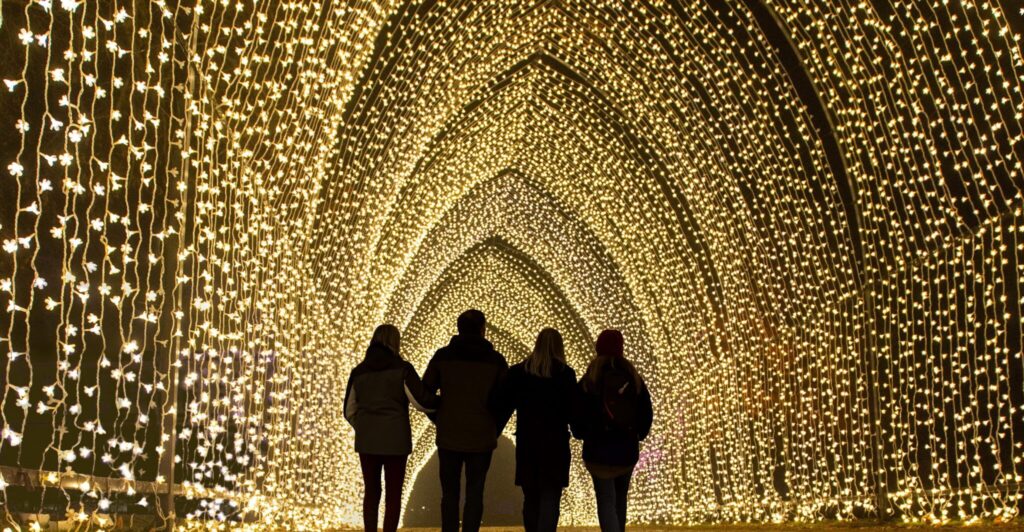 People walking under Lightscape lights